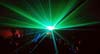 Laser F/X performing a scanned beam effect at the Sideshow rave