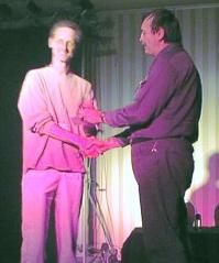 Second Place winner Tim Walsh accepts his award