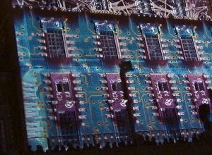 Detail of the image where the palace is covered in IC chips and circuit boards 