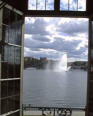 Tall window overlooking the city and waters of Stockholm