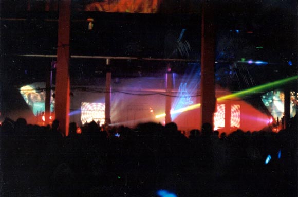 Image of multiple laser systems in use at the Ascension 2000 rave 